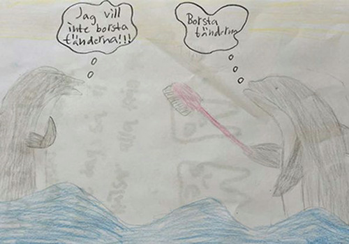 Teckning på badande delfiner som pratar om tandborstning